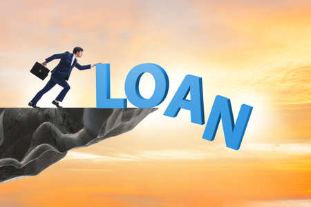 Debt and loan concept with businessmanの写真素材