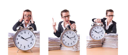 Woman businesswoman with giant alarm clockの写真素材