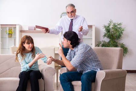 Young pair visiting experienced doctor psychologistの写真素材