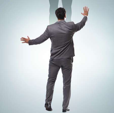 Businessman with aspiration of becoming superheroの写真素材