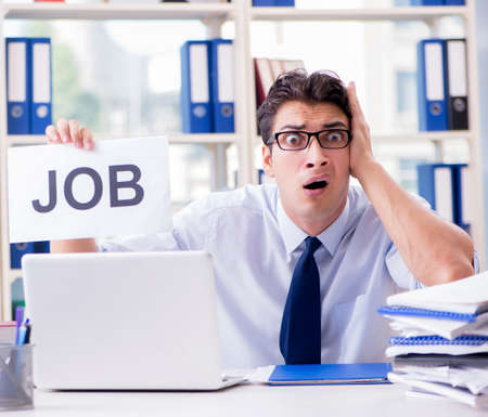 Young businessman looking for job in unemployment conceptの写真素材