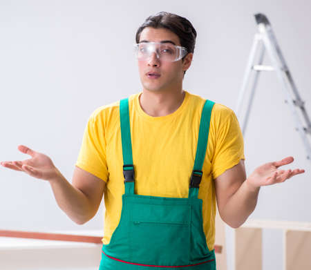 Worker wearing protective goggles at construction site