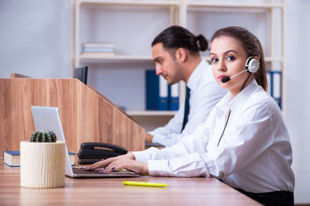 Call center operators working in the office