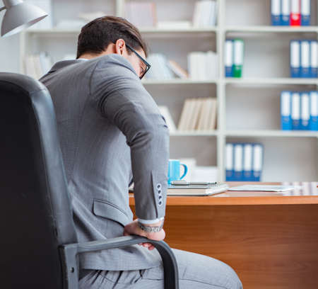 Young businessman working in the officeの写真素材