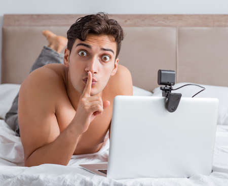 Young sexy man in online dating conceptの写真素材