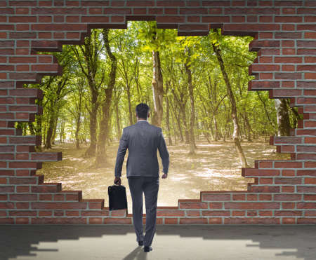 Businessman escaping for summer vacationの写真素材