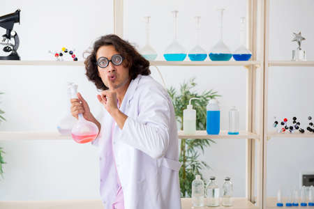 Funny male chemist working in the labの写真素材