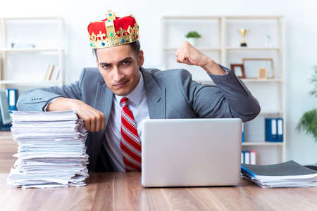 King businessman at his workplaceの写真素材