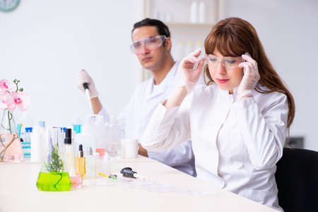 Two chemists working in the labの写真素材