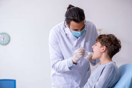 Young boy visiting doctor in hospital