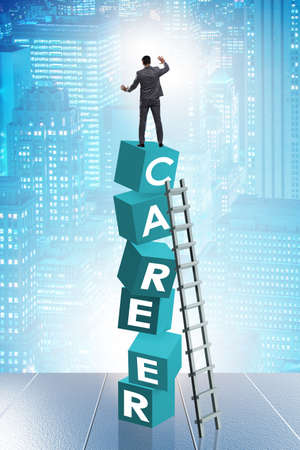 Career concept with businessman on top of blocksの写真素材