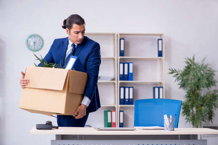 Young employee being made redundantの写真素材