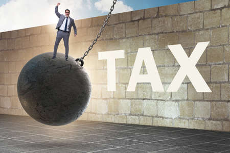 Businessman in tax return submission conceptの写真素材