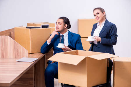 Two employees being fired from their workの写真素材