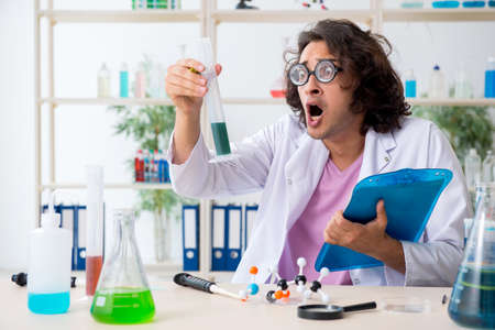 Funny male chemist working in the labの写真素材