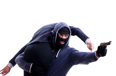 Businesswoman is kidnapped by the gunmanの写真素材