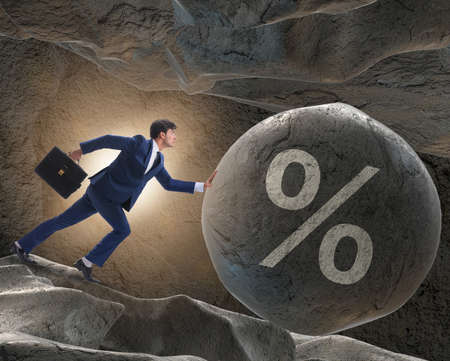 Businessman in high interest debt business concept
