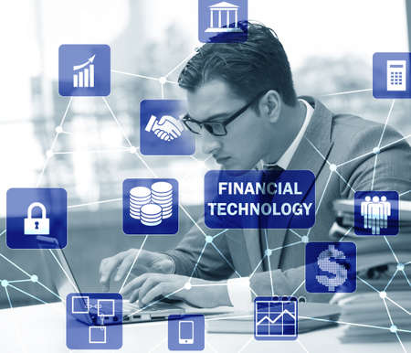 Businesswoman with laptop in financial technology fintech concepの写真素材