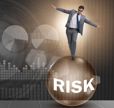 Young businessman in business risk and uncertainty conceptの写真素材