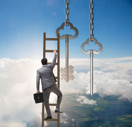 Businessman in key to financial success conceptの写真素材