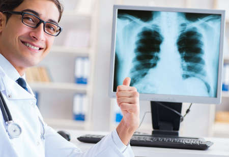 Doctor radiologist looking at x-ray images