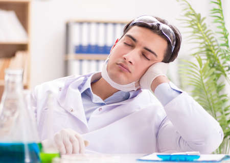 Male doctor working in the lab on virus vaccineの写真素材