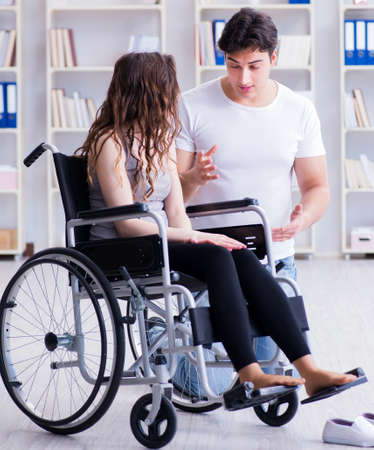 Patient undergoing rehabilitation recovery programme with doctorの写真素材