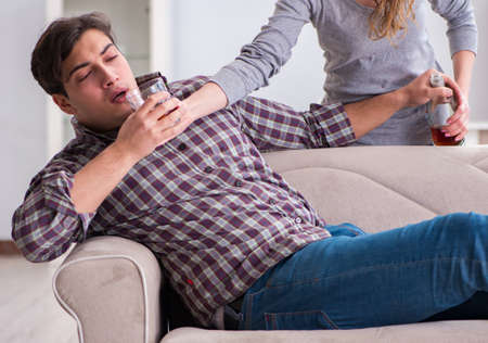 Drinking problem drunk husband man in a young family concept