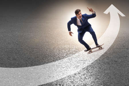 Businessman riding skateboard on financial graph