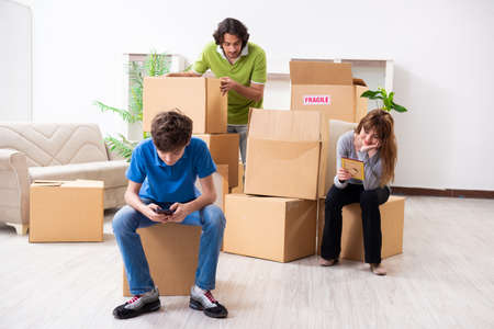 Young family moving to new flat