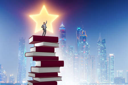 Business education concept with businessman and booksの写真素材