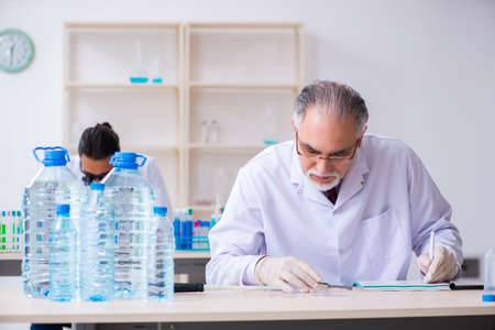 Two chemists working in the labの写真素材