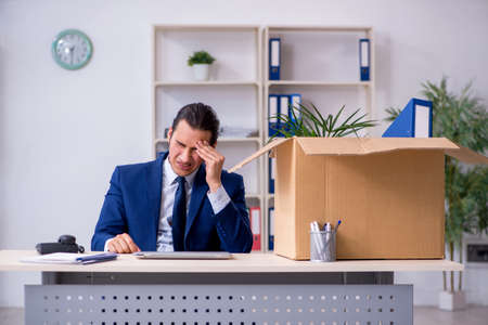 Young employee being made redundantの写真素材