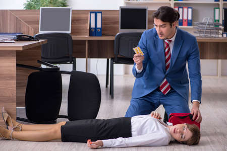 Young employee suffering in the office