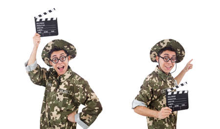 Funny soldier with movie board isolated on the whiteの写真素材