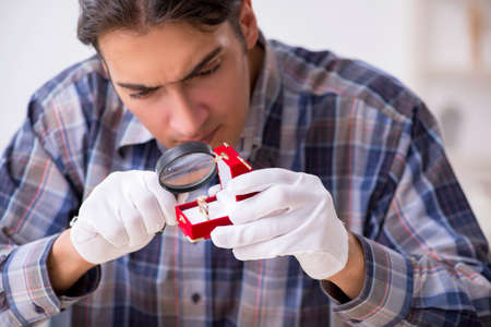 Young male jeweler at workshop