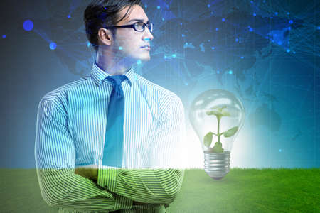 Green energy anc ecology concept with businessman