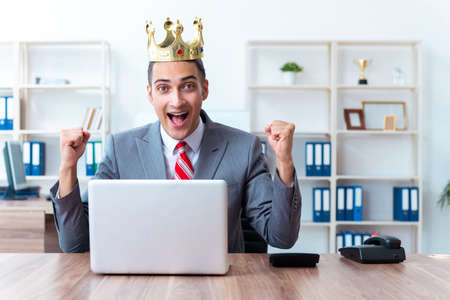 King businessman at his workplaceの写真素材