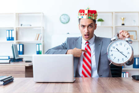 King businessman at his workplaceの写真素材