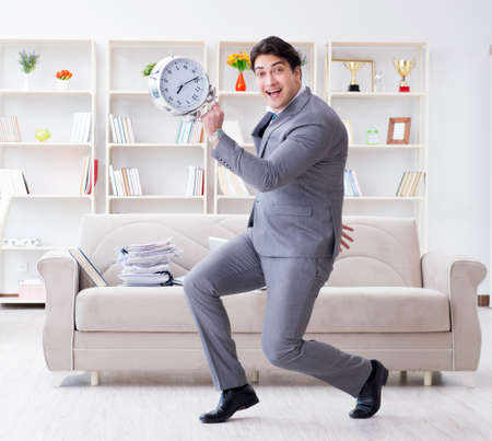 Businessman happy meeting his deadlinesの写真素材