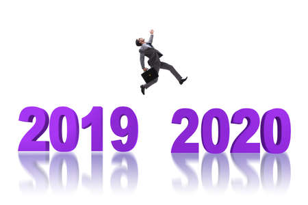 Businessman jumping from year 2019 to 2020