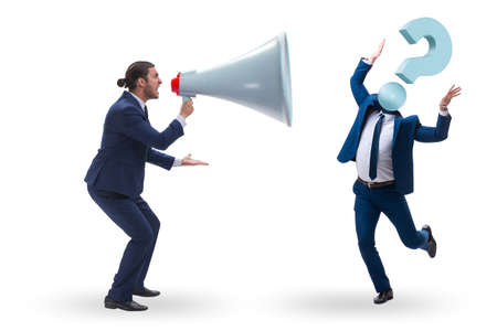 Businessman shouting through large loudspeaker