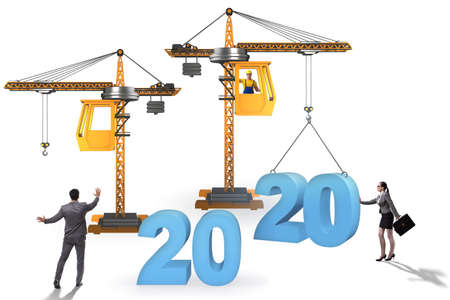 Crane lifting year 2020 in business concept