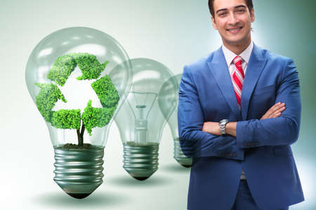 Green energy anc ecology concept with businessmanの写真素材