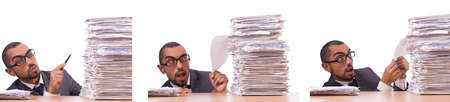 Busy businessman with lots of papers