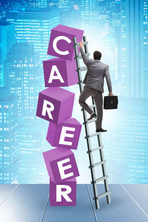 Career concept with businessman on top of blocksの写真素材