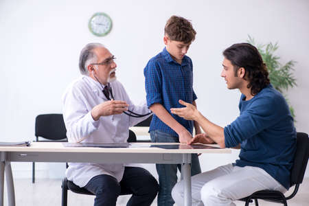 Young boy visiting doctor in hospital