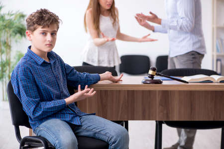 Divorcing family trying to divide child custodyの写真素材
