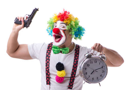 Funny clown with an alarm clock isolated on white backgroundの写真素材