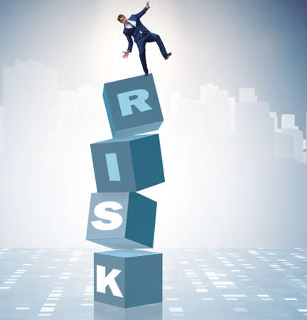 Businessman in risk and reward business conceptの写真素材